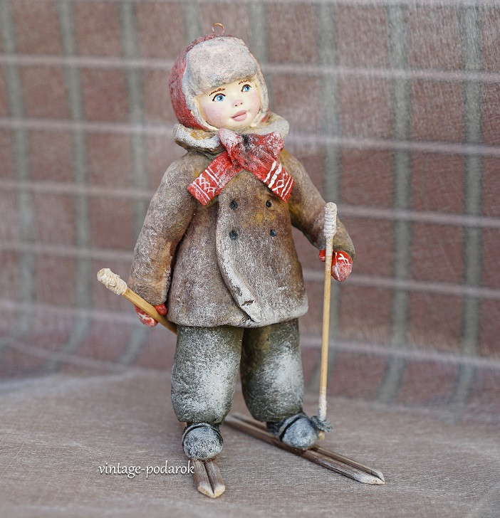 игрушка мальчик на лыжах